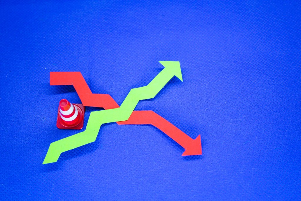 Wooden blocks with up and down arrows. The concept of lowering and increasing indices, exchange rate